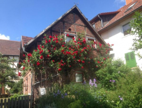 Pretty half-timbered cottage on romantic yard
